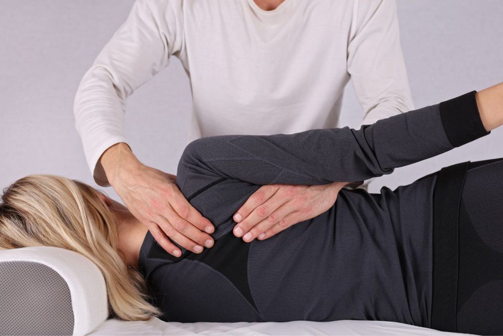 spine adjustment on a car accident victim by a chiropractor